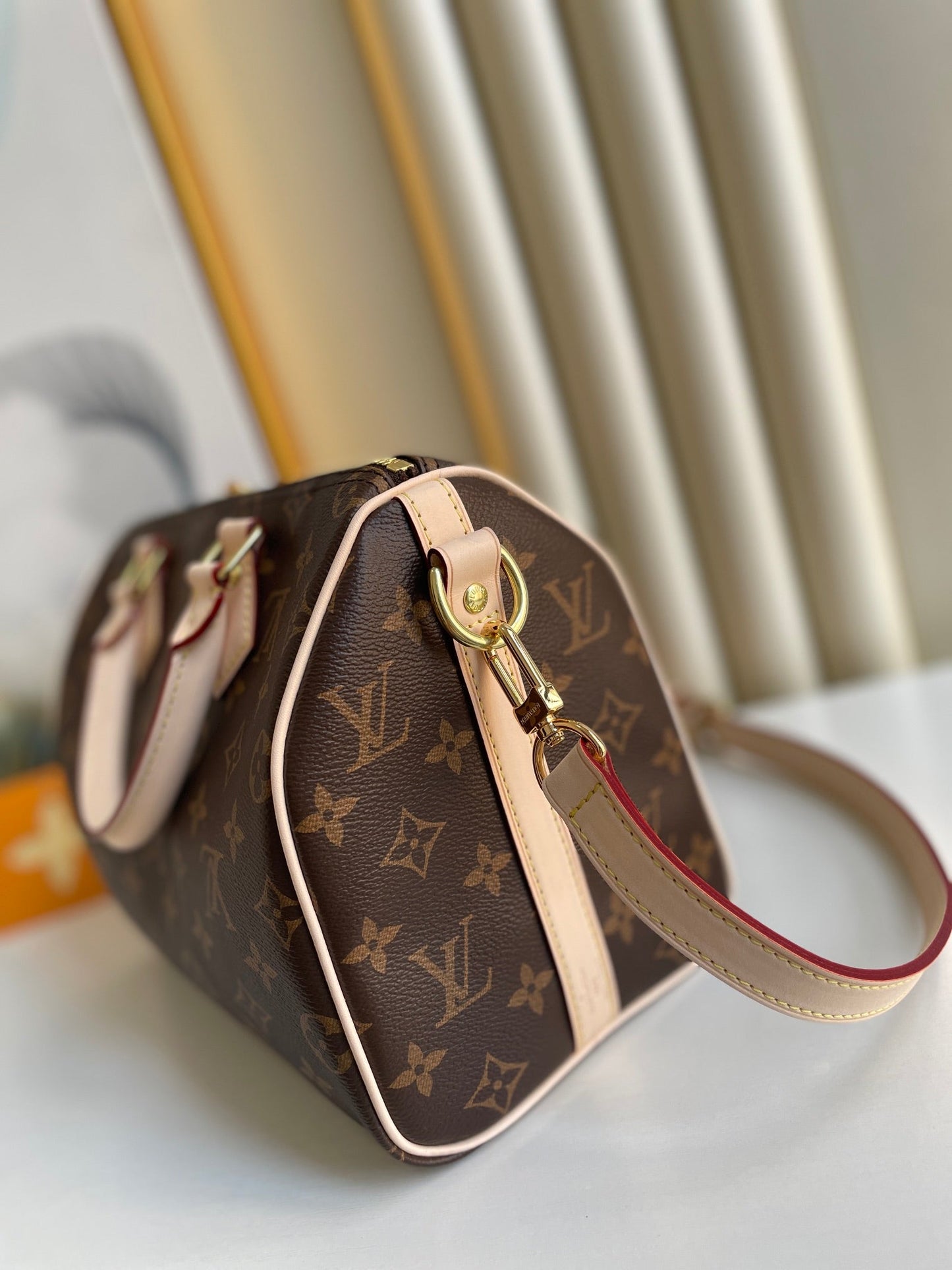 LV SPEEDY BANDOULIÈRE 25