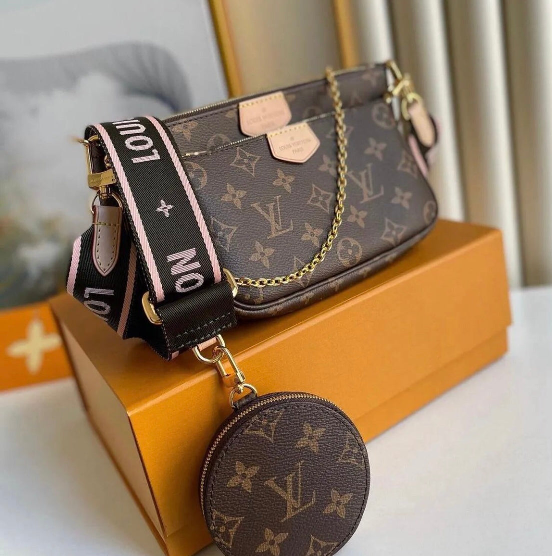 LV MULTI POCHETTE ACCESSOIRES